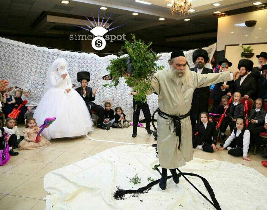 Rav Gamliel Rabinowitz dancing at the Mitzvah Tantz of a family member ...